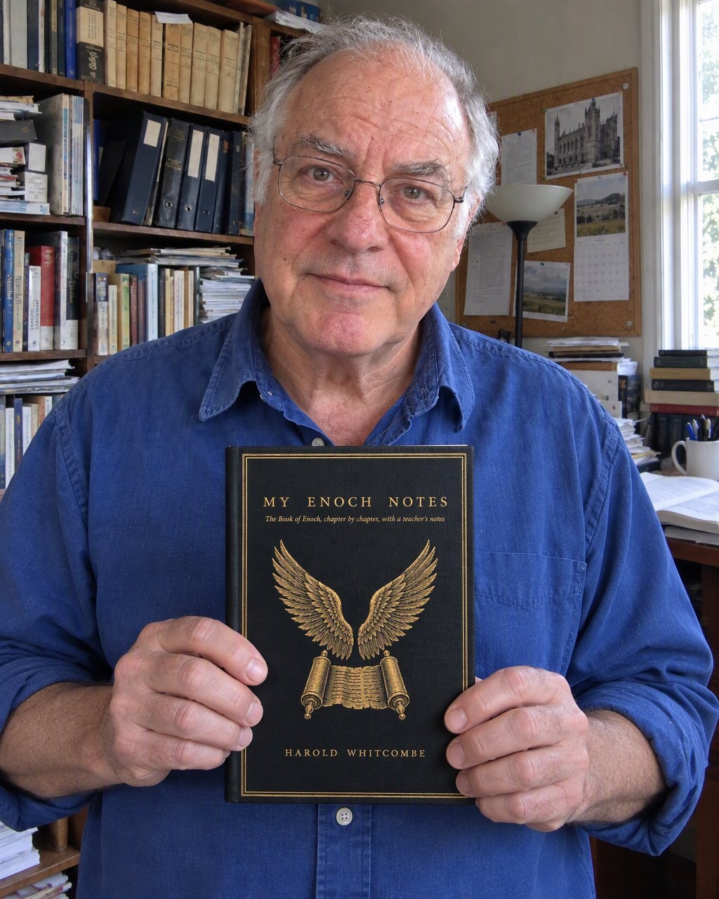 Harold Whitcombe holding a copy of My Enoch Notes